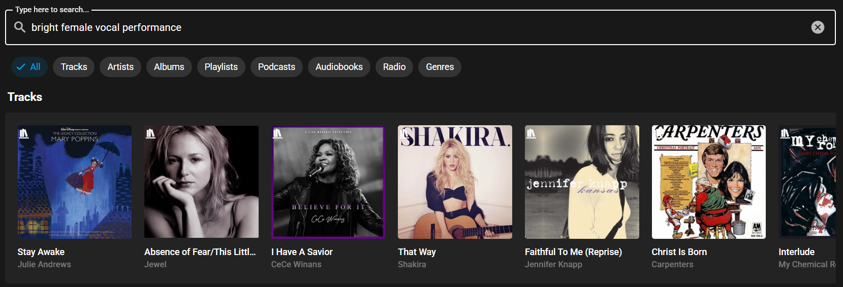 Free-text search returning matching tracks for "bright female vocal performance"